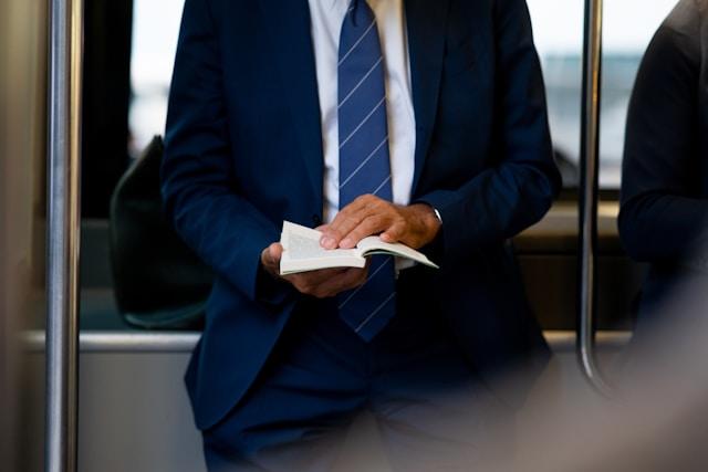 person holding book